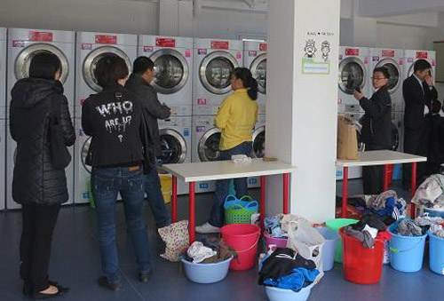 街头投币式工业洗衣机将会成为一种时尚洗衣方式